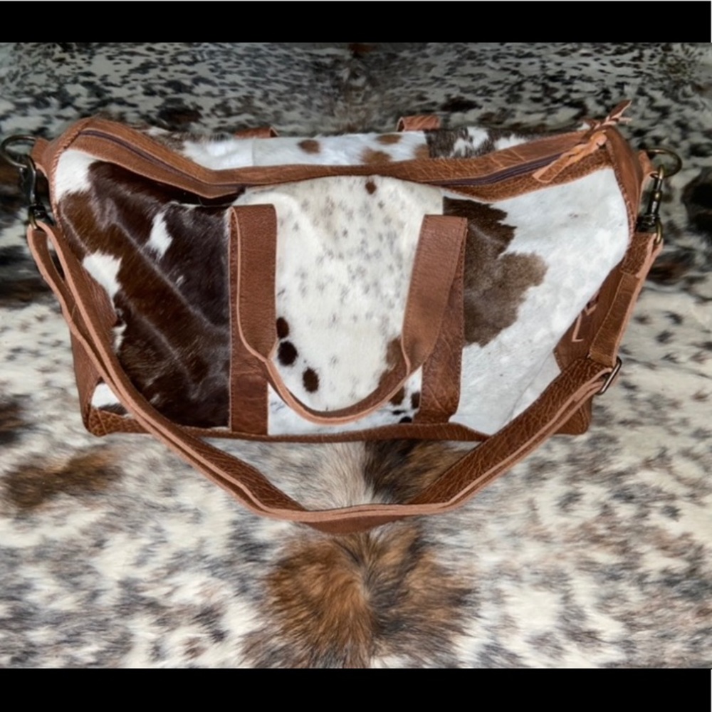 Cowhide duffle bag